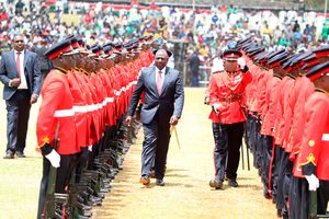 President Dr William Ruto inspects a guard of honour during the Mashuja Day celebrations
